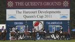 Queen's cup action in front of the dewitt giant clock